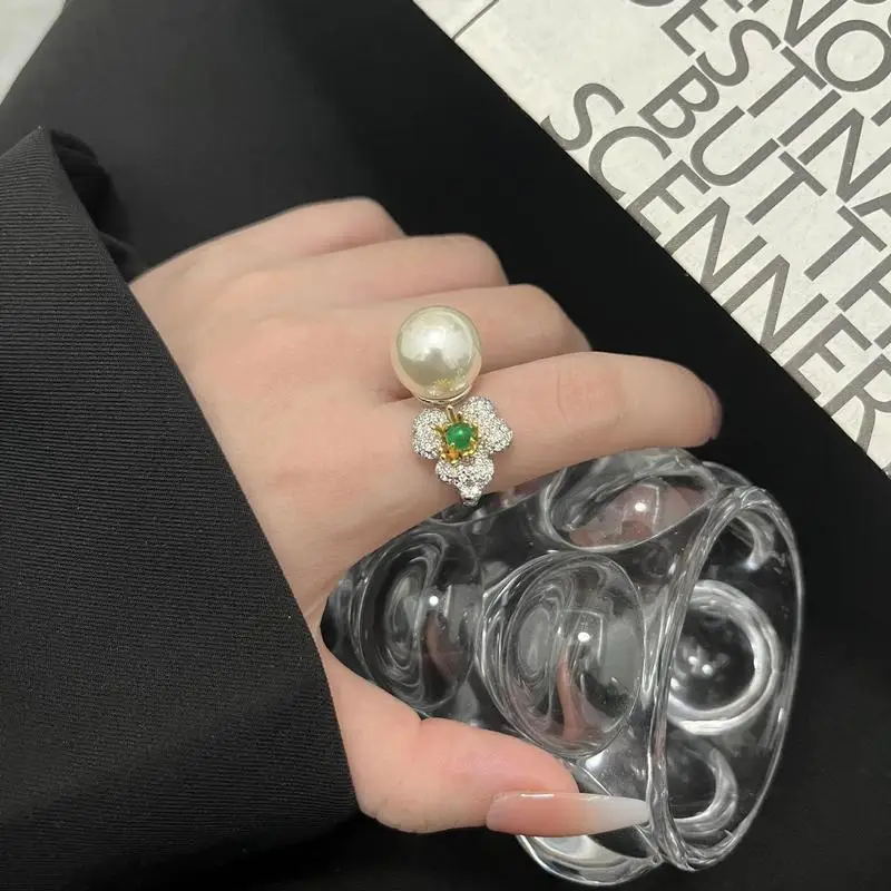 Pure silver European and American fashion ring imitating natural Australian white beads, niche design flower pearl women's ring