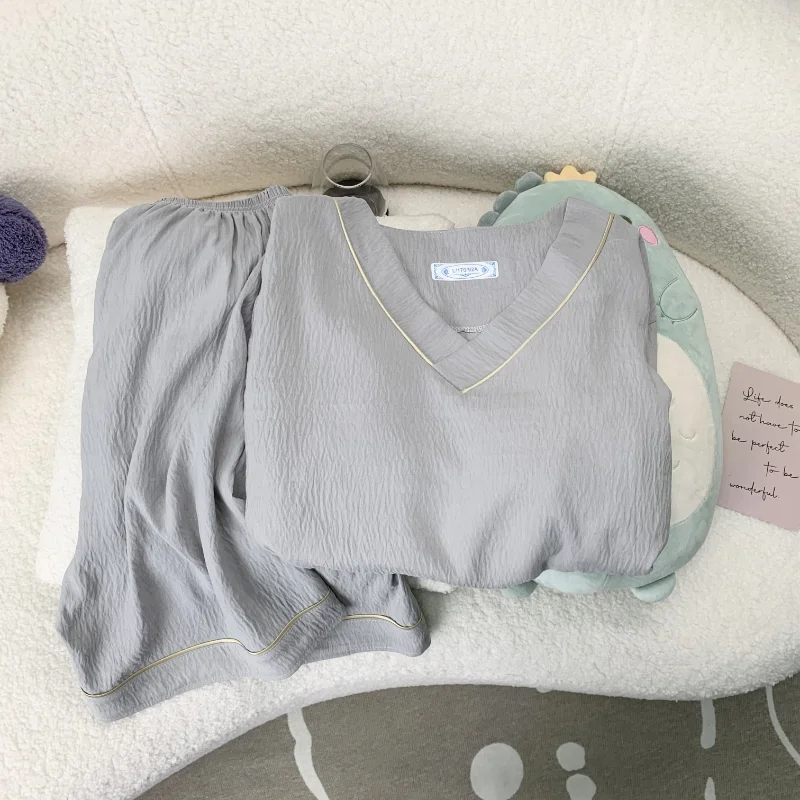 Novedad de verano 2025, pijamas cortos informales lisos para hombre, conjunto de pijamas sencillos de moda con cuello en V fino de estilo coreano para hombre