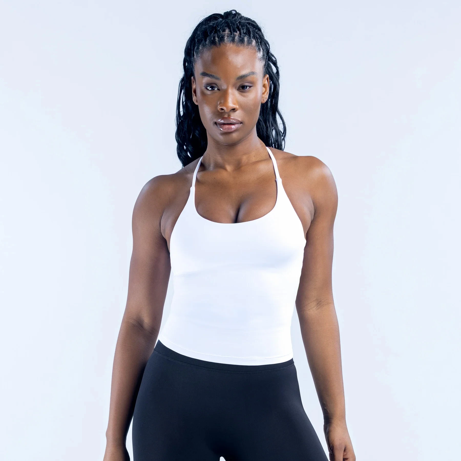 Long-length sports yoga vest with thin shoulder straps; women's sleeveless fitness top; stylish undergarment designed for back s