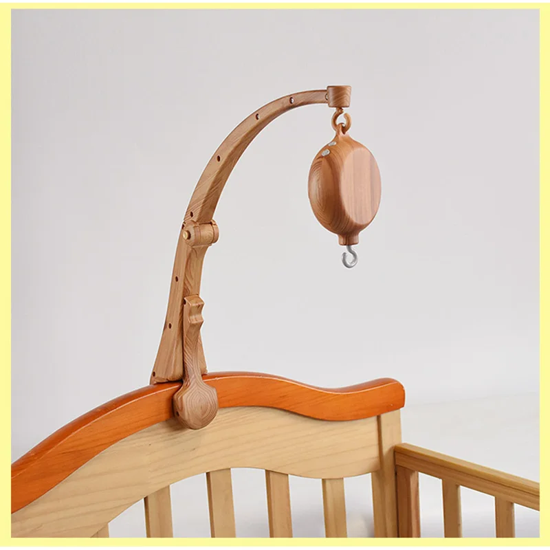 Culla per bambini supporto per campanello da letto sospeso Mobile stampa supporto per carillon in plastica a grana legno staffa per braccio decorativo