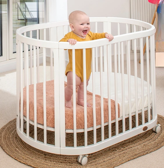 

Solid wood baby crib, multifunctional movable round bed, multi stage splicing bed