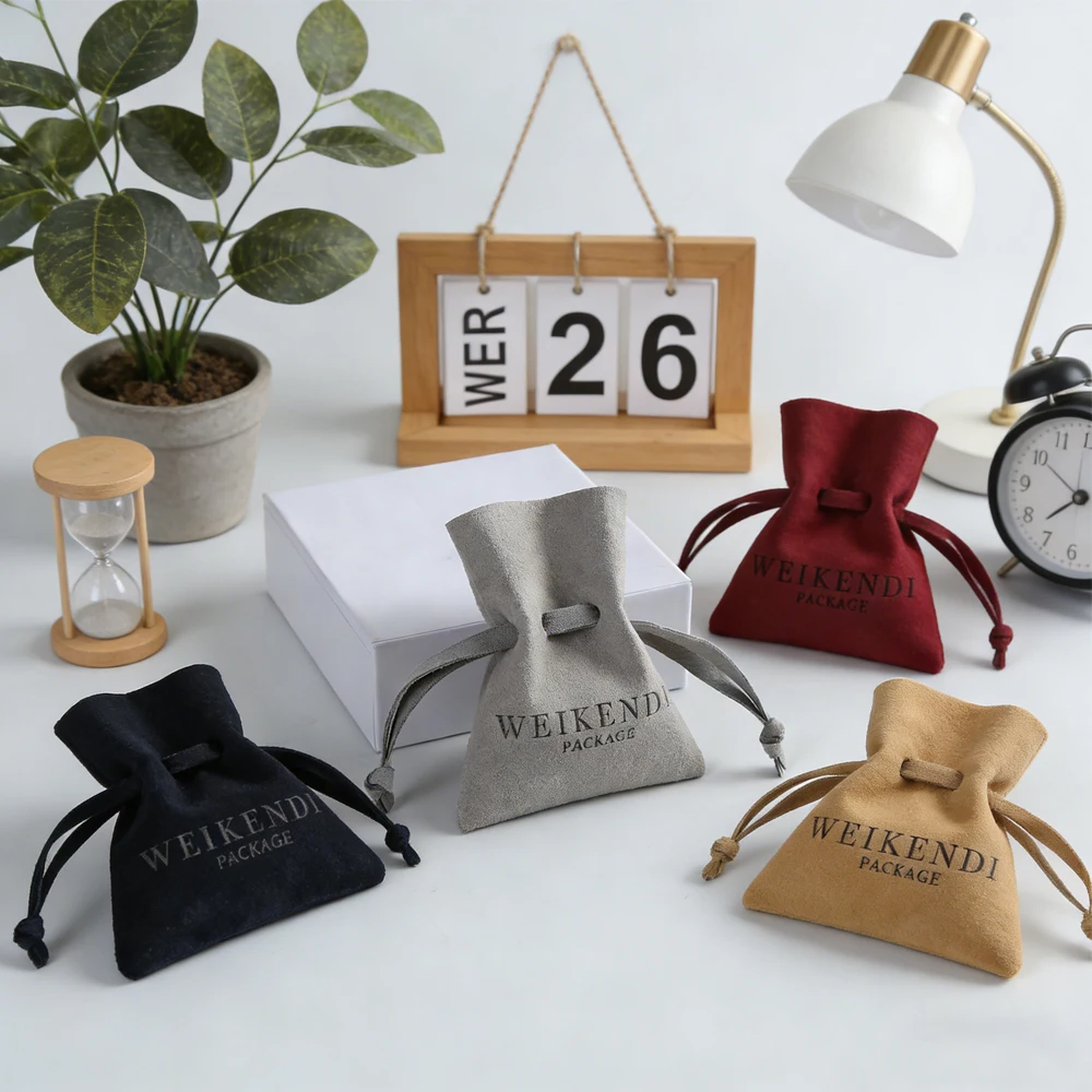 

Custom Logo 50pcs Cream Microfiber Drawstring Gift Bag Jewelry Packaging Personalized Small Ring Earring Watch Storage Case Bags