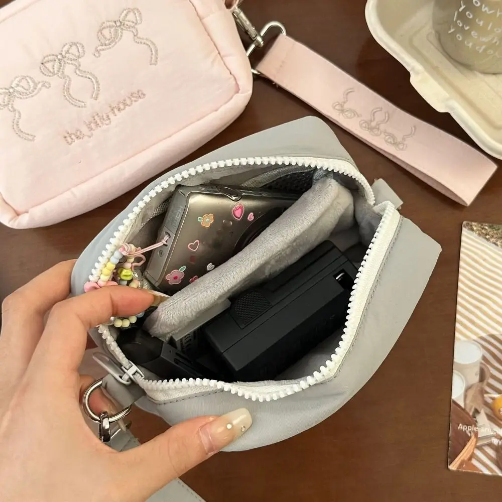 Con cordino con cerniera, cinturino da polso, portafoglio, portachiavi, borsa con fiocco ricamato, borsa per trucco, borsa per auricolari, borsa per rossetto, tasca per monete in nylon