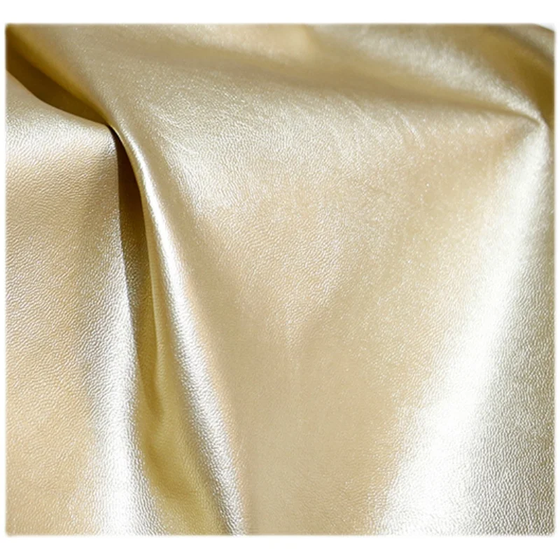 

Champagne Gold Fine Grain Texture Leather Handmade Background Fabric Soft Leather Non-Elastic High-End Clothing Designer Fabric