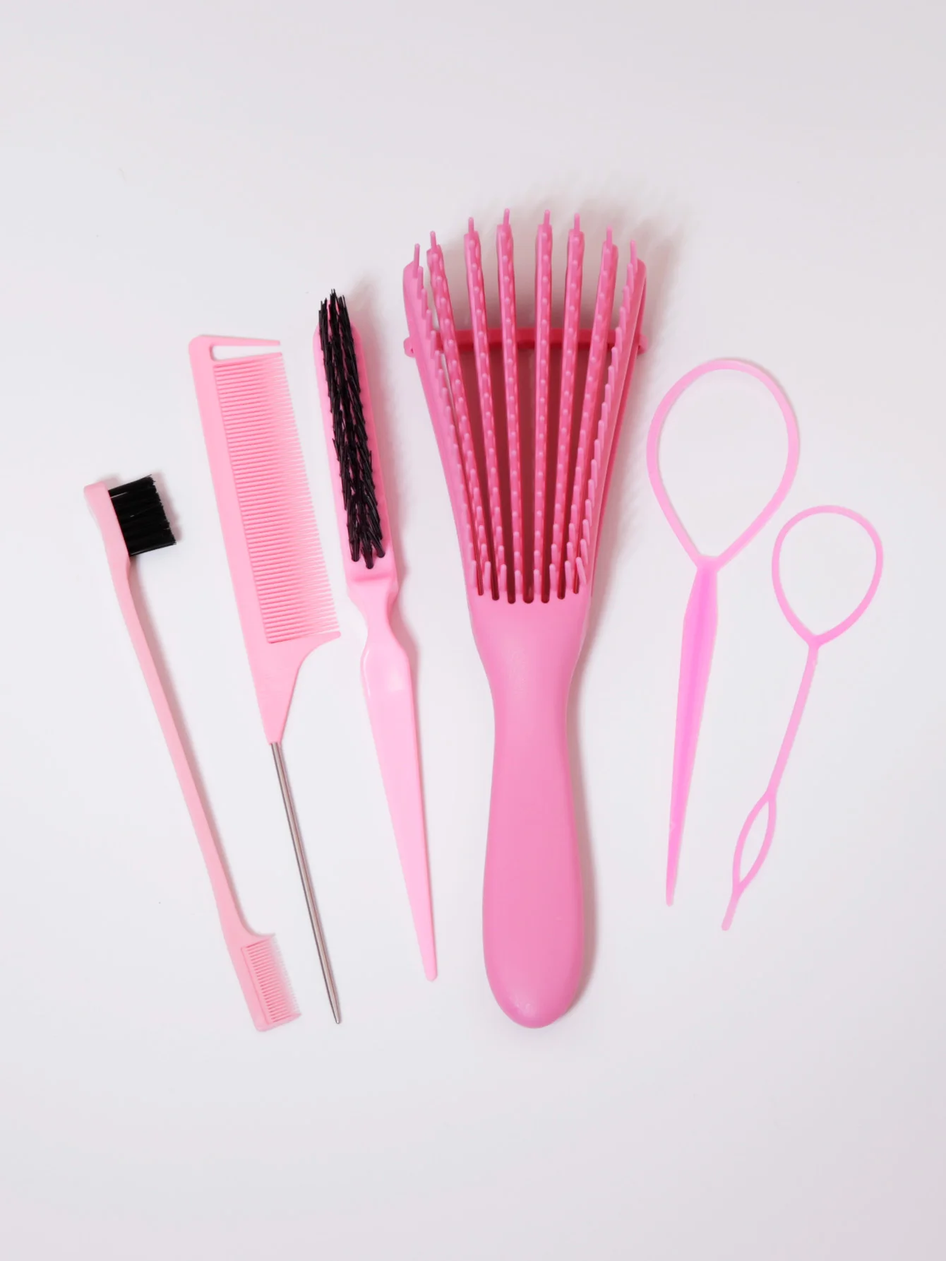 Comb set, including exfoliating comb, nylon hair brush, steel needle pointed tail comb, edge control brush, and hair tail tool