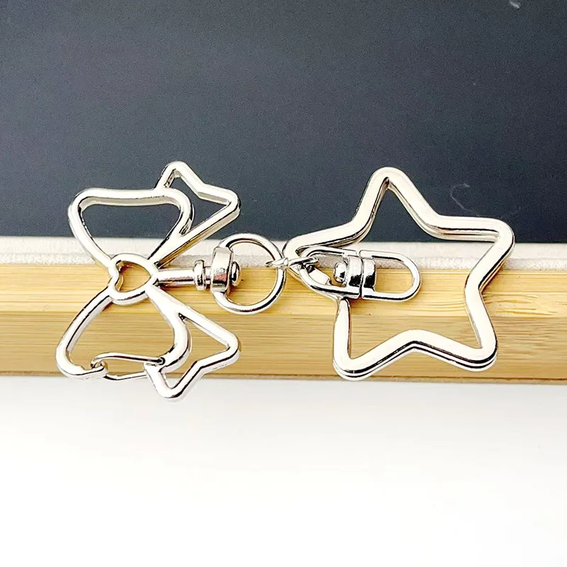 6-12 Stück Bogen Schlüsselanhänger Figur Acht Schnalle Stern Schlüsselanhänger Auswurfsschnalle DIY Spielzeug Schmuck Anhänger Link Herstellung Großhandel – Detail 3