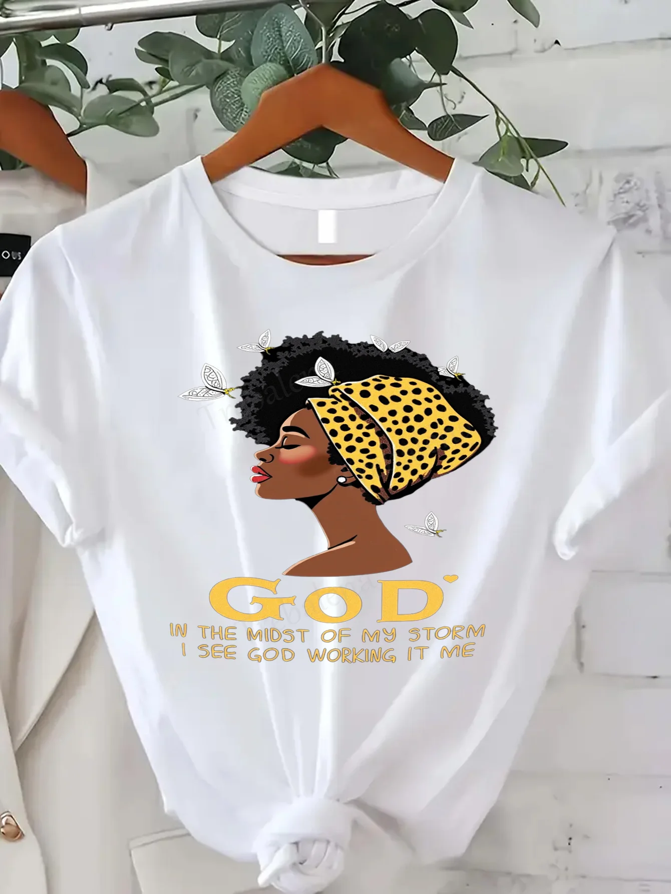 T-shirt da donna T-shirt da donna afro "Dì nella mia tempesta" - Fede e stile per donna