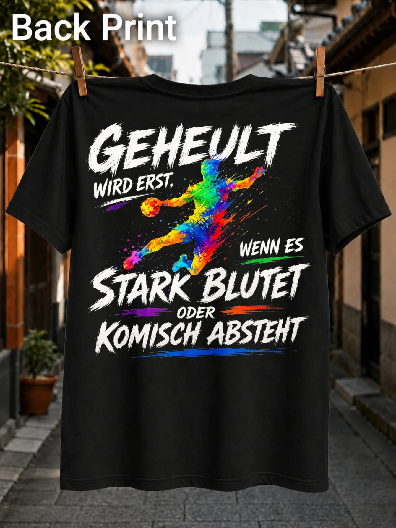 colorful paint splash sports player with German injury humor GEHEULT WIRD ERST WENN ES STARK BLUTET  Unisex All T-Shirt
