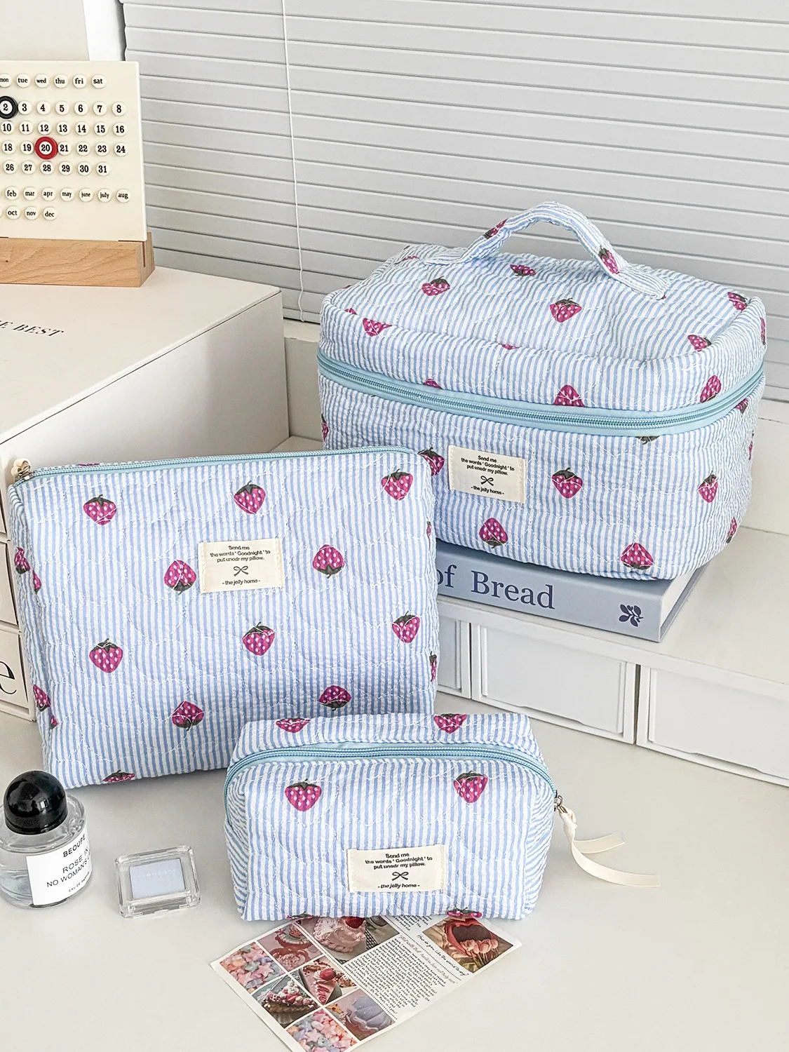 Exquisite printed large-capacity portable student toiletry bag with strawberry stripes, blue quilted new model