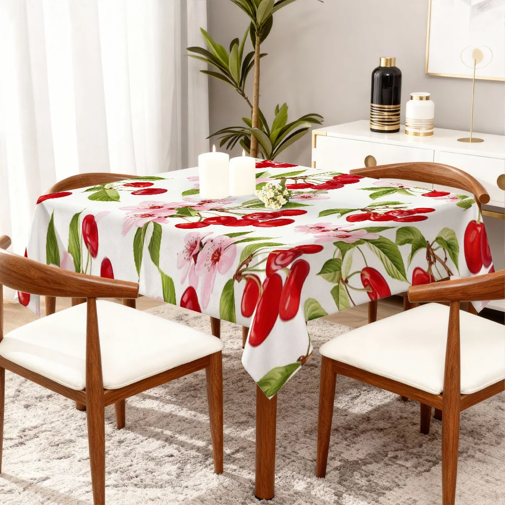 A tablecloth with cherry and flower designs, which is perfect for creating a peaceful kitchen atmosphere.xzj