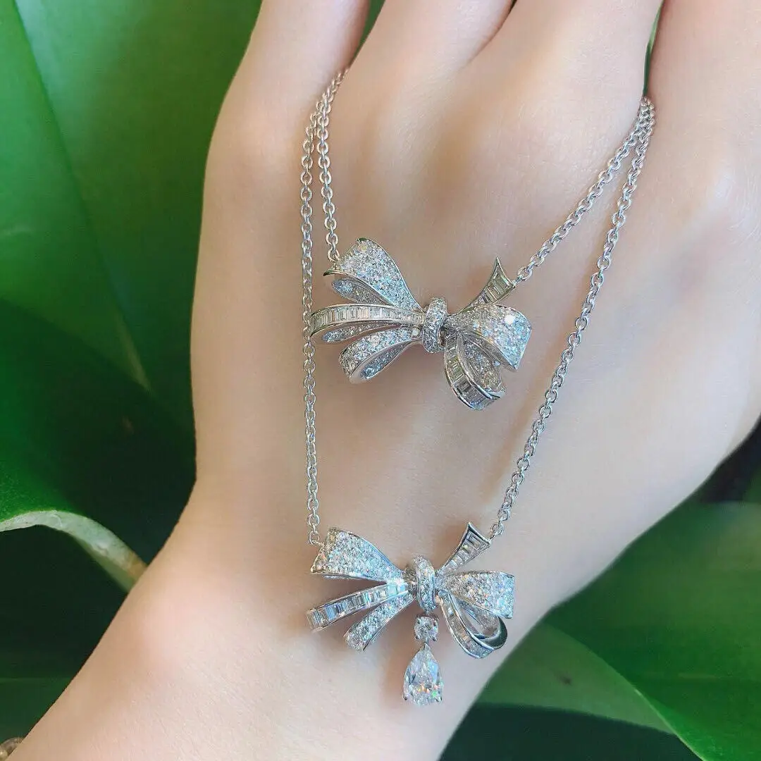 الفرنسية الفاخرة Bowknot موضة المرأة قلادة Tilda's القوس S925 الفضة عالية الجودة مويسانيتي لامعة الساحرة حفلة هدية عيد