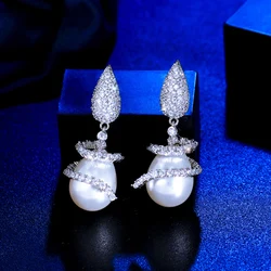 CWWZircons Symmetrical Rotating Cubic Zirconia Drop Dangle Pearl Earrings for Women Elegant CZ Wedding Bridal Jewelry Gift CZ475
