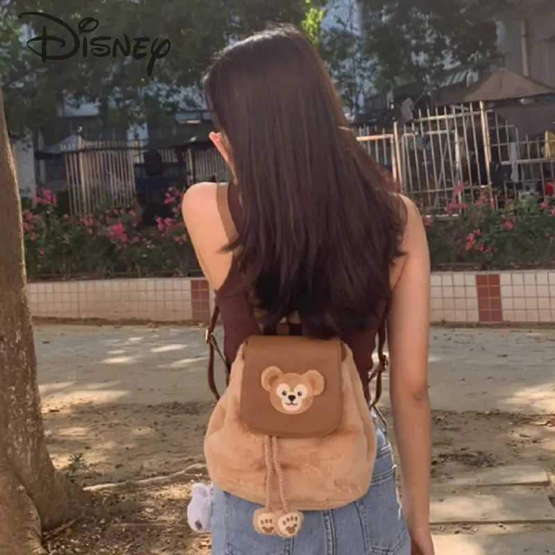 Disney Daffy-Mochila De felpa de alta calidad para mujer, morral escolar versátil con cordón, informal, de dibujos animados, a la moda