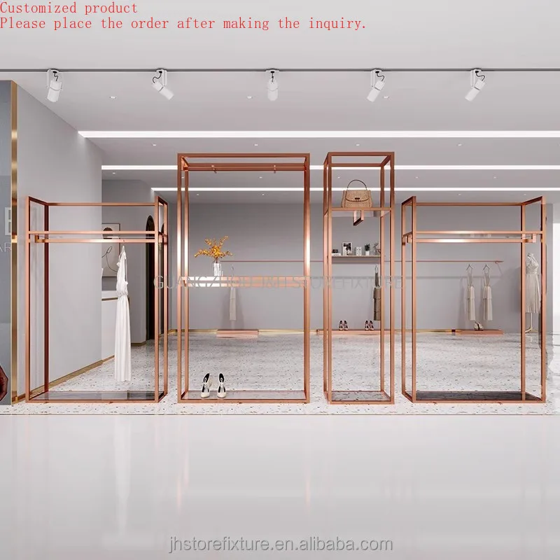 

Custom.Stainless Steel Acrylic Boutique Store Display Shelves Clothes Rack for Clothing Store Clothing Shop Furniture