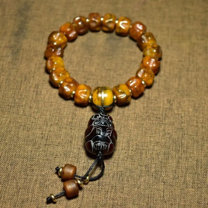 Tibetan-style cow bone and passion seed beads paired with a horn Pixiu bracelet   Weighs 60 grams