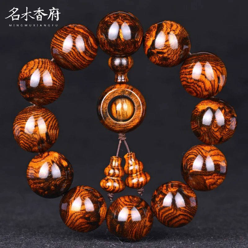 

Senior Dalbergia odorifera authentic Hainan huanghuali bracelet men's tiger skin pattern, landscape pattern, spider pattern 2.0