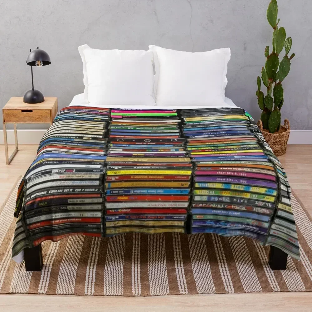 

Stacks of CDs Throw Blanket Bed Soft Luxury Brand Plaid on the sofa Blankets