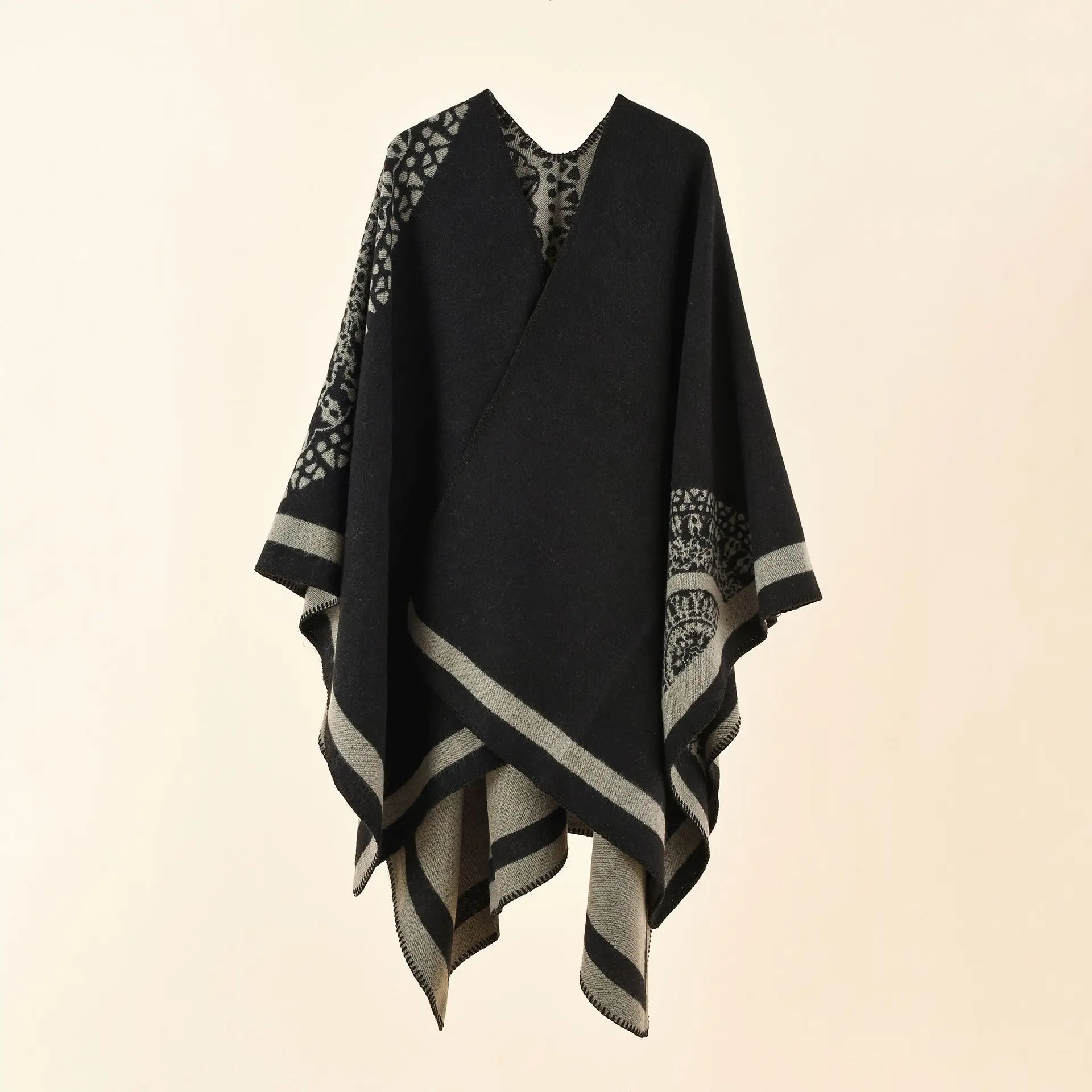 A woman\'s shawl a cape a warm, winter-proof shawl