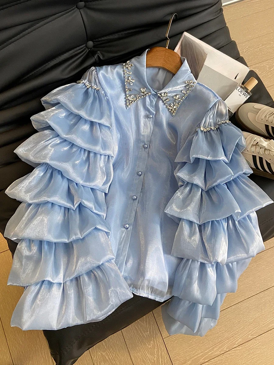 2025 Primavera Nuova camicia alla moda chic Bellissimo diamante Comfort allentato Camicie con bordo foglia di loto Manica lunga femminile Top monopetto