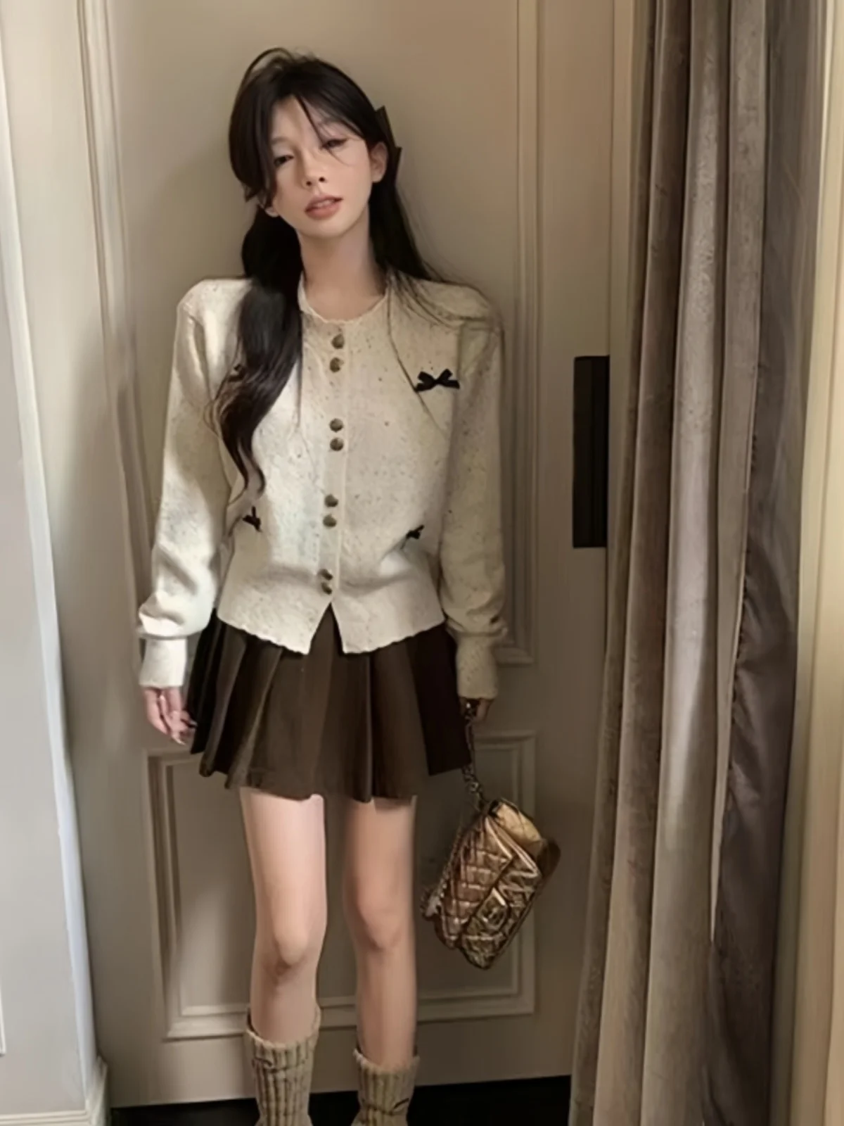 Pull femmes début du printemps noeud mince longue carte coréenne douce fille petit rond tricoté