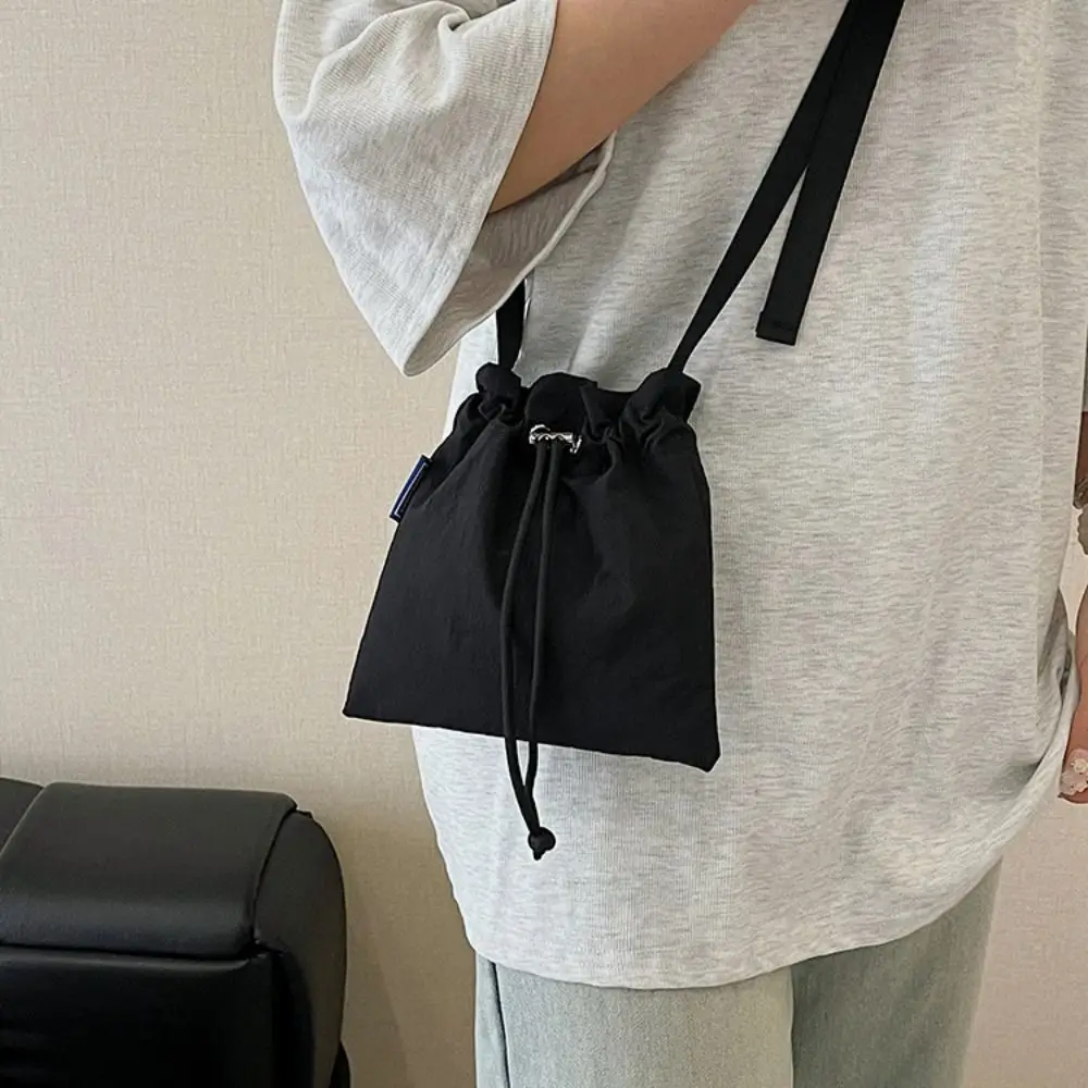 

Cute Korean Style Drawstring Bucket Bag Crossbody Bag Purse Nylon Shoulder Bag Solid Color Quick-dry Mobile Phone Bag Sport