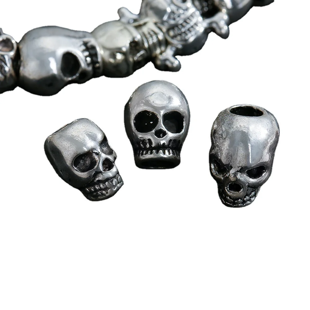 A variety of funny skull-shaped pendants, punk bracelets and necklaces in the Gothic style of Europe and America