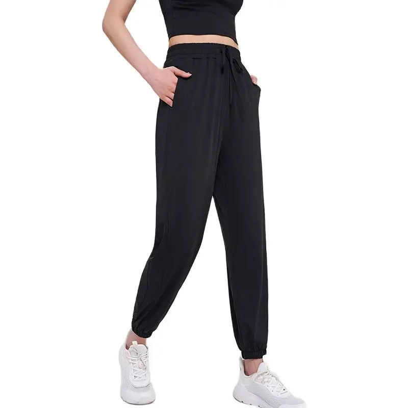 SOISOU Pantaloni da donna in Nylon pantaloni sportivi da palestra pantaloni sportivi larghi da Yoga abbigliamento sportivo traspirante elastico vita