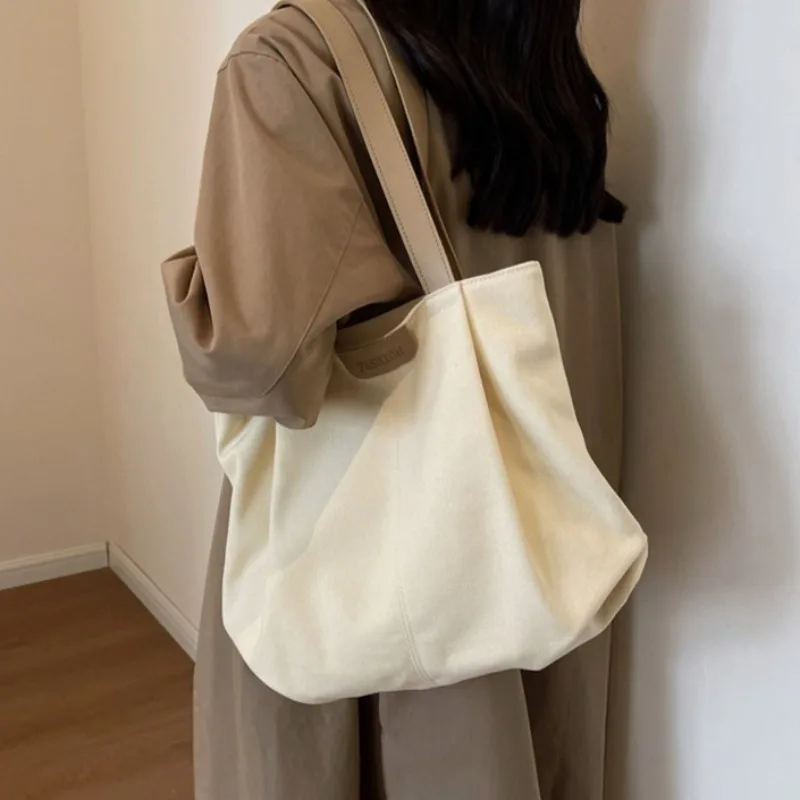 

Large capacity canvas bag, women's autumn and winter fashion casual shoulder handbag, student class commuting tote bag