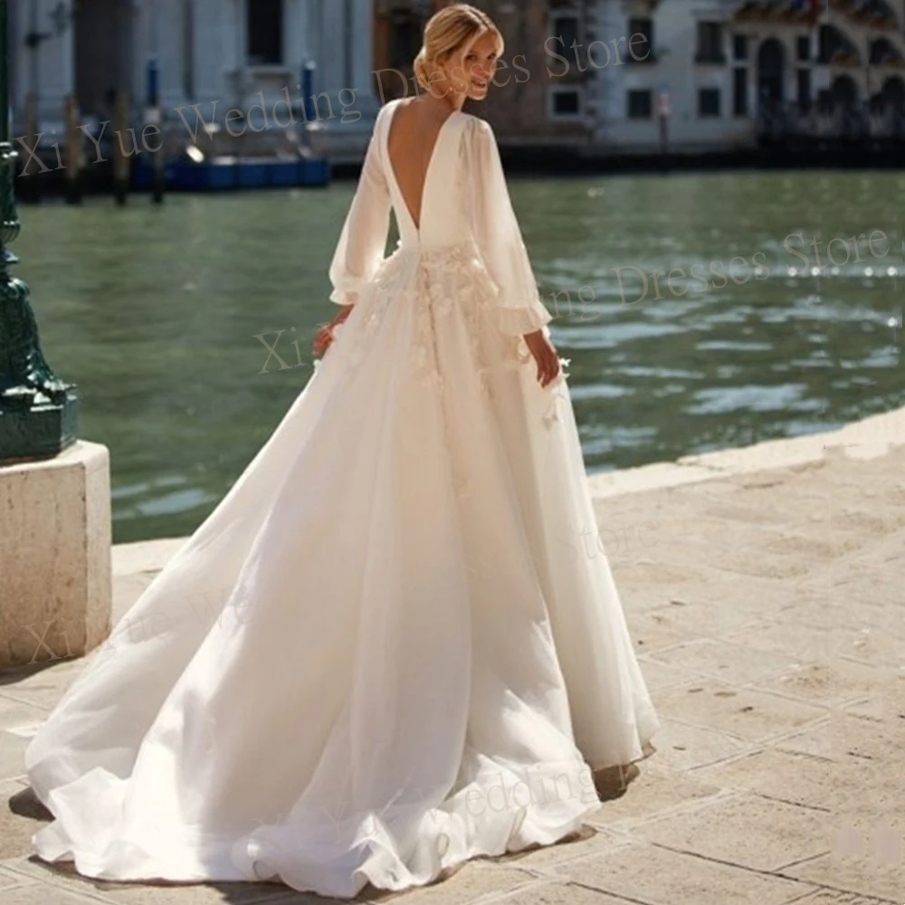 2025 Affascinanti abiti da sposa da donna A Line con scollo a V Fiori 3D Abiti da sposa personalizzati Manica lunga Backless Abiti da sposa