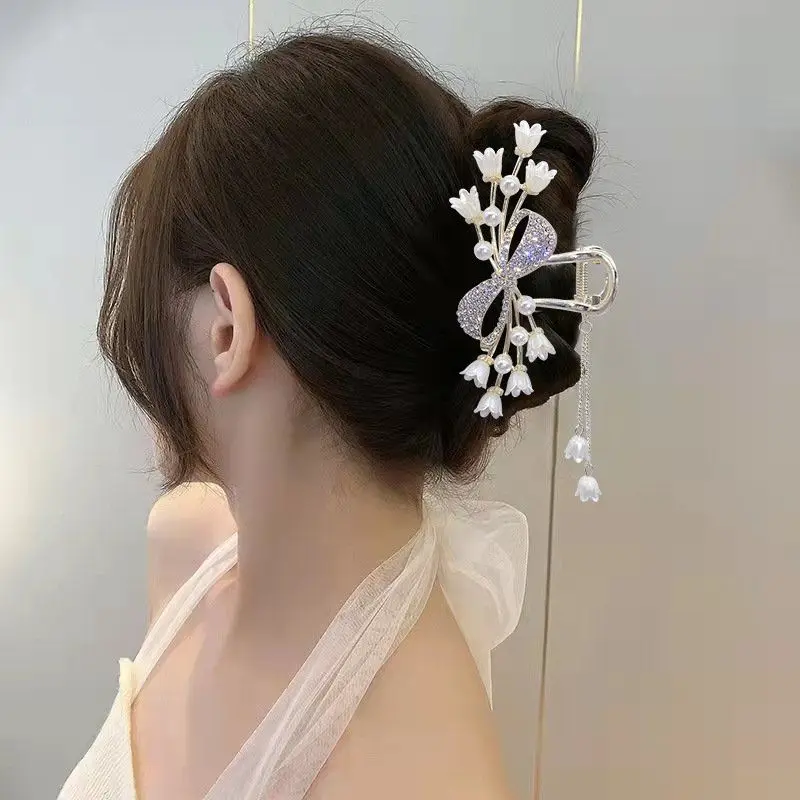 Clip de agarre con borla de mariposa Gu Feng Ling Lan Hua, nuevo producto, Pan Hair Showcase, elegante, decoración de lujo de gama alta