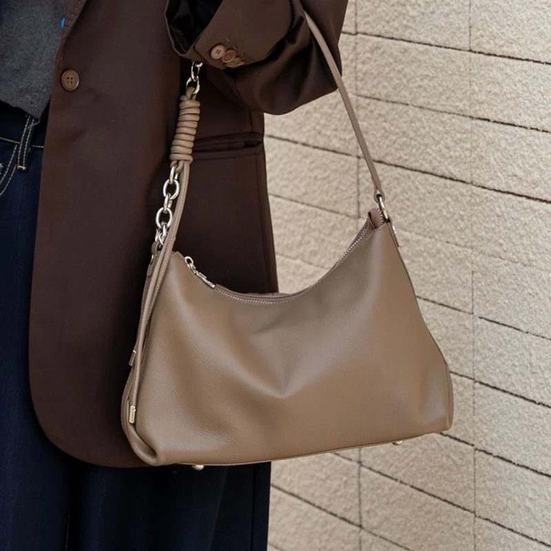 Hifashion خمر البقرة جلد طبيعي لينة المتشرد حقائب كتف للنساء 2025 الفاخرة مصمم نصف القمر Crossbody حقائب سيدات