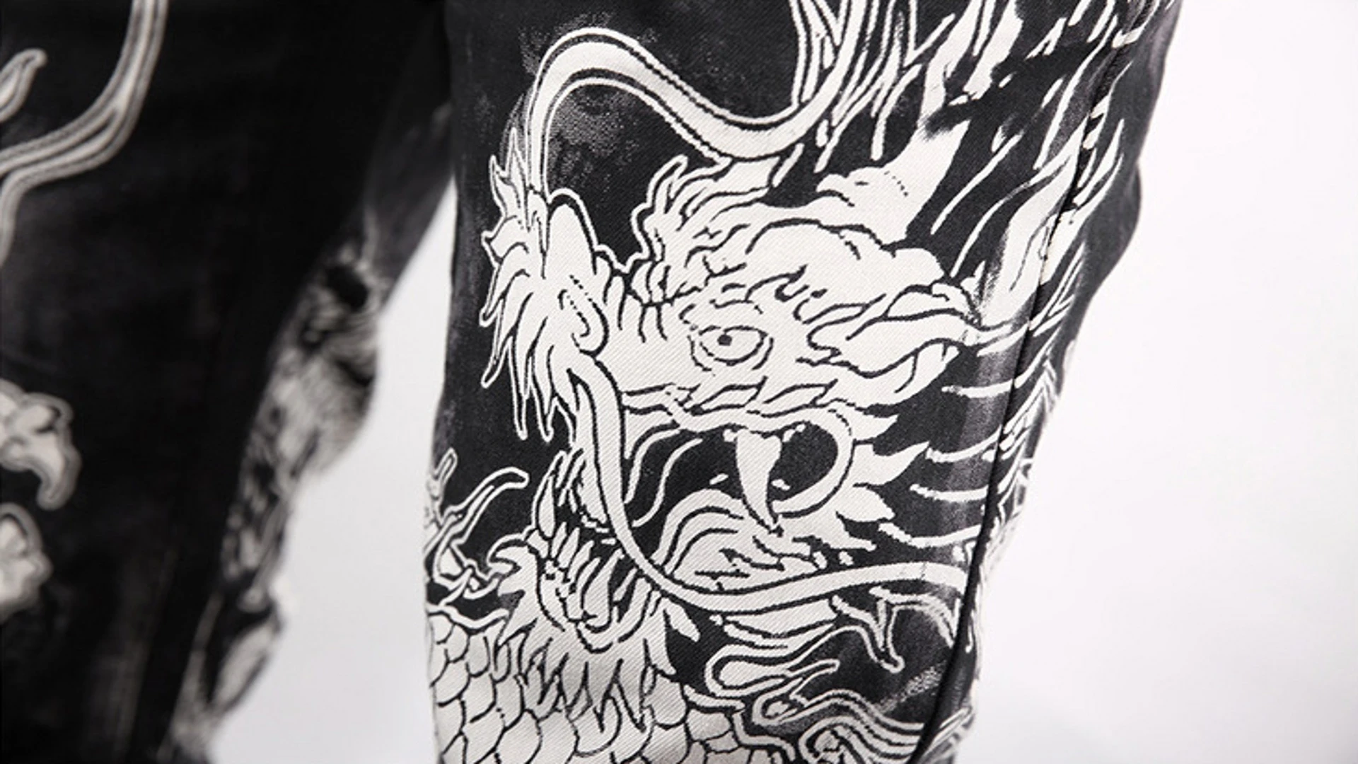 ฤดูใบไม้ผลิผู้ชายแฟชั่น Slim Casual บุคลิกภาพกางเกงสีดํามังกรจีนพิมพ์กางเกงยีนส์ชาย PLUS ขนาดนักร้องพิมพ์กางเกง