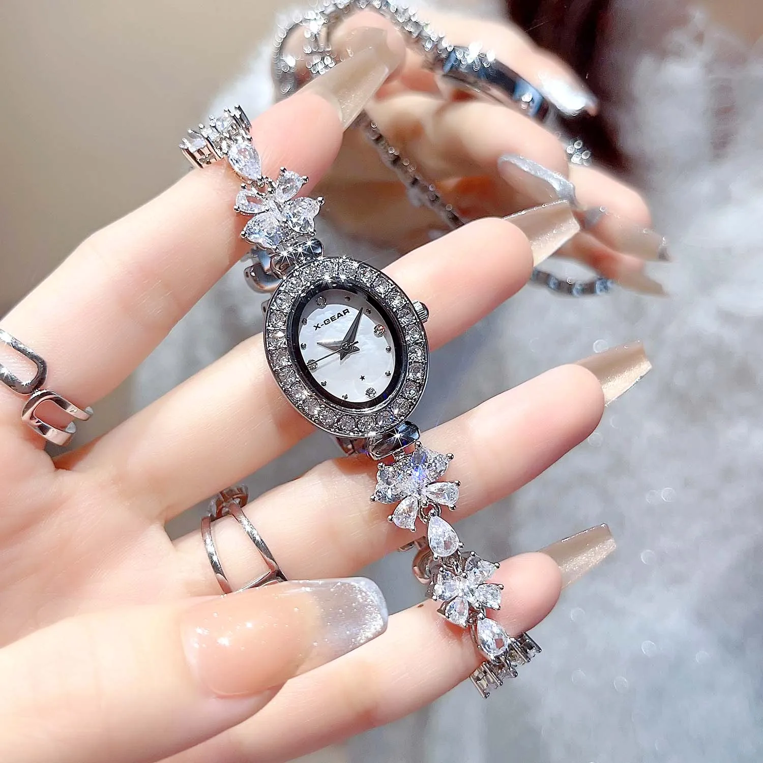 ساعة نسائية كوارتز حركة مقاومة للماء سوار عصري فاخر ساعة ماسية كاملة هدية للفتيات