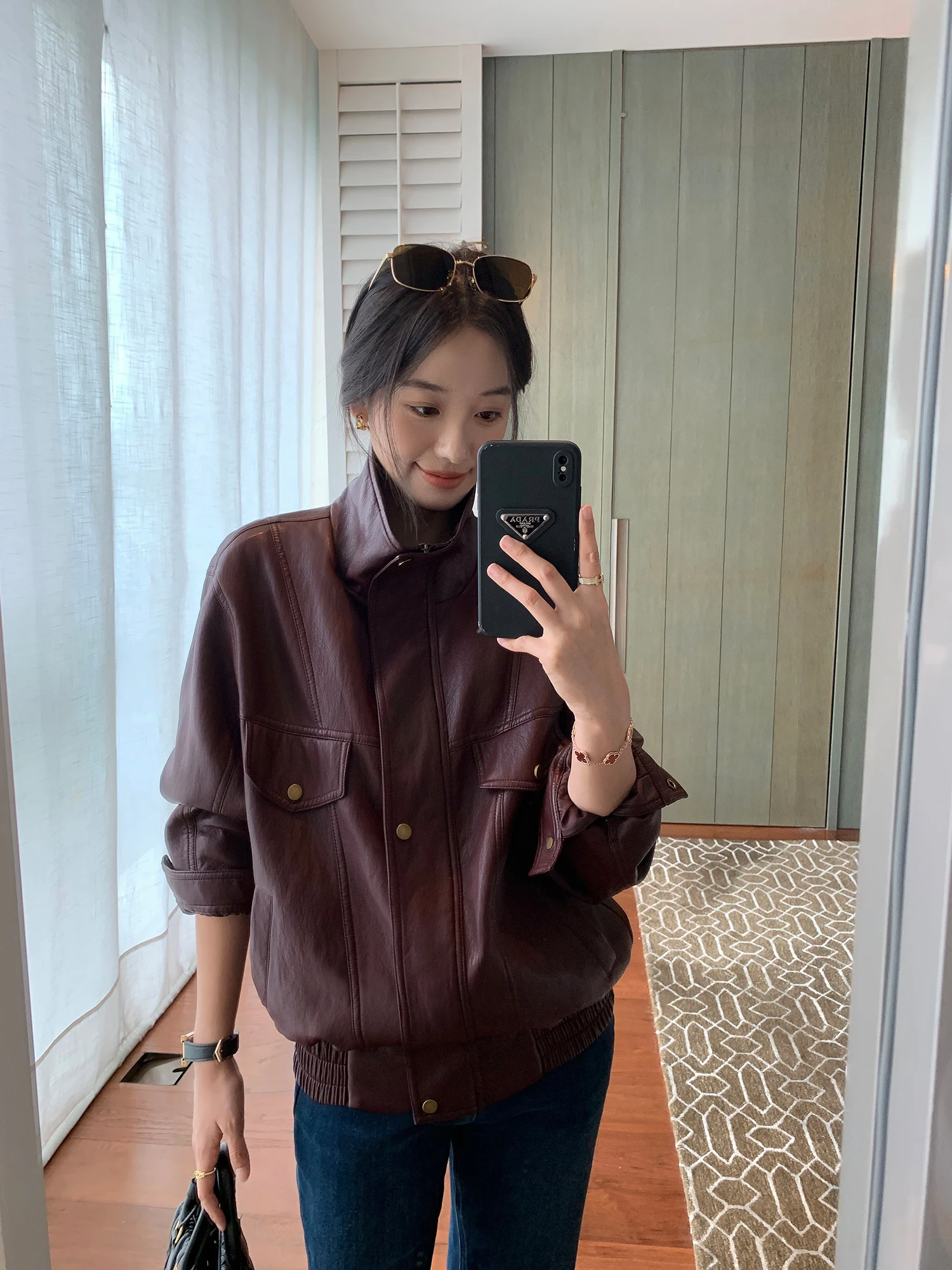 Stylowa kurtka motocyklowa damska z PU skóry, luźny krój, stójka, długi rękaw, idealna do dojazdów do pracy, modna.