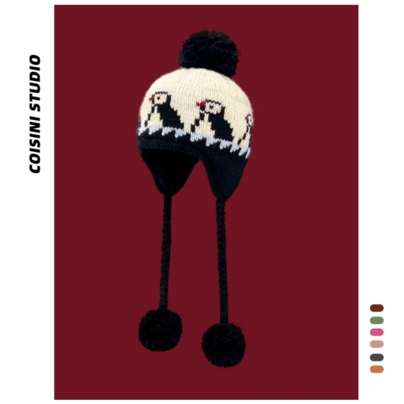 Gorro de punto con protección para los oídos de Jacquard de pingüino de dibujos animados coreano para hombres y mujeres, gorros de bombardero con cordones y bolas de pelo cálidas para invierno