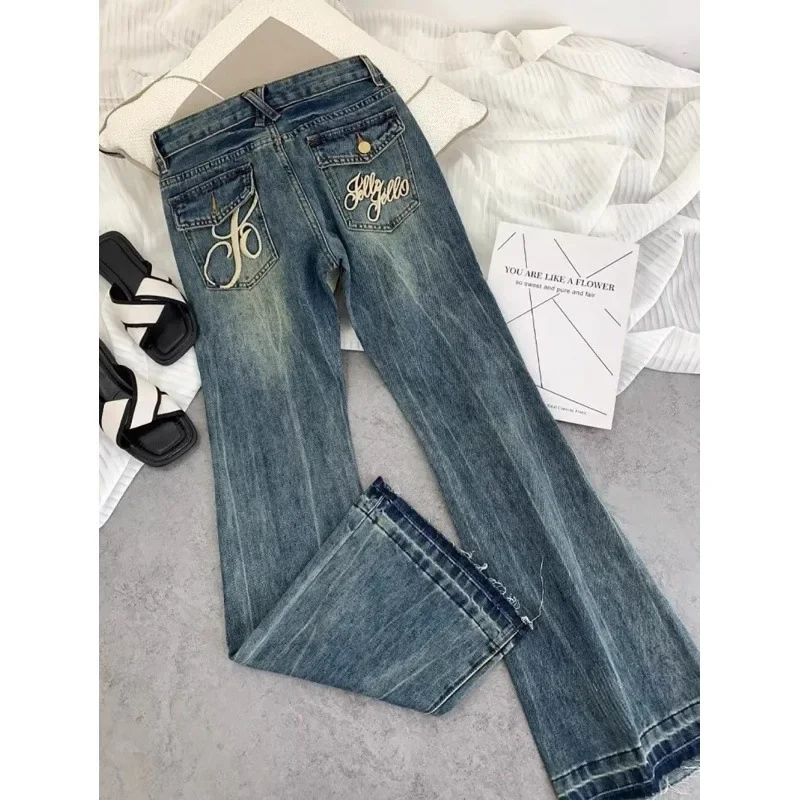 American retro low-waisted jeans female autumn new embroidery old casual fashion temperament slim Joker bell bottoms.