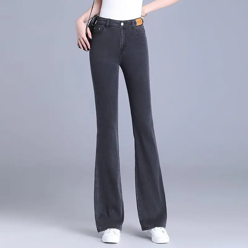 Pantalones vaqueros de cintura alta con botones para mujer, ropa con bolsillos, temperamento de tendencia, corte de bota que combina con todo, Color sólido, nueva moda, primavera y otoño