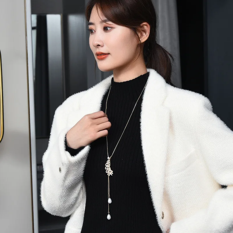 Multi-functional and personalized sweaters, long chain necklaces, and women's feather tassel pendants