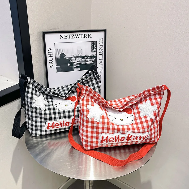 حقيبة كتف منقوشة ناعمة لطيفة من Hello Kitty للسيدات ذات سعة كبيرة وحقيبة قماش كروس للطالبات وحقيبة التنقل اليومية