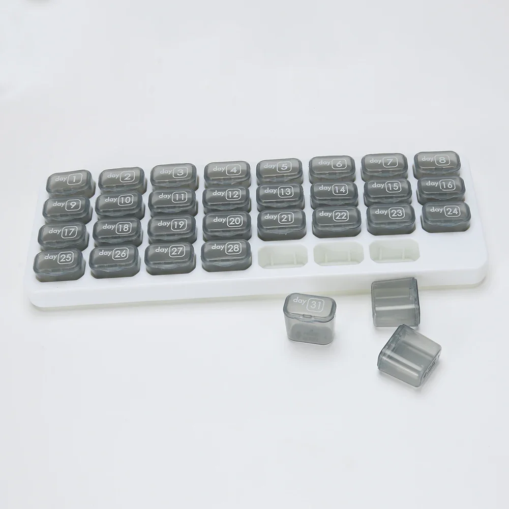 Dispenser di pillole mensile da 31 giorni Scatola portapillole portatile Custodia per medicinali a forma di tastiera per pillole di olio di fegato di merluzzo e vitamine