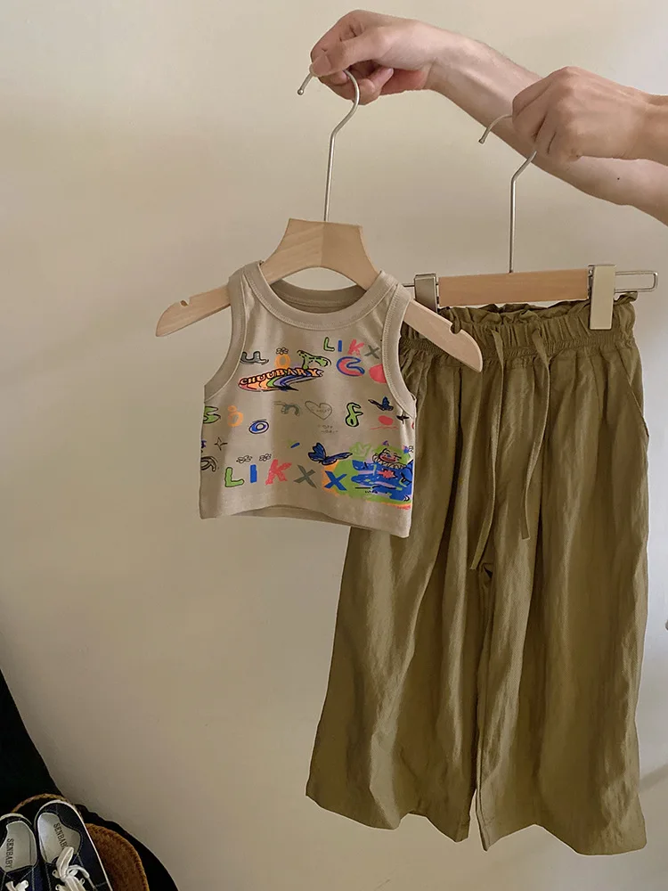 Conjunto de dos piezas con estampado de dibujos animados para niña pequeña, pantalones informales con encaje, nuevo diseño, verano, 2024