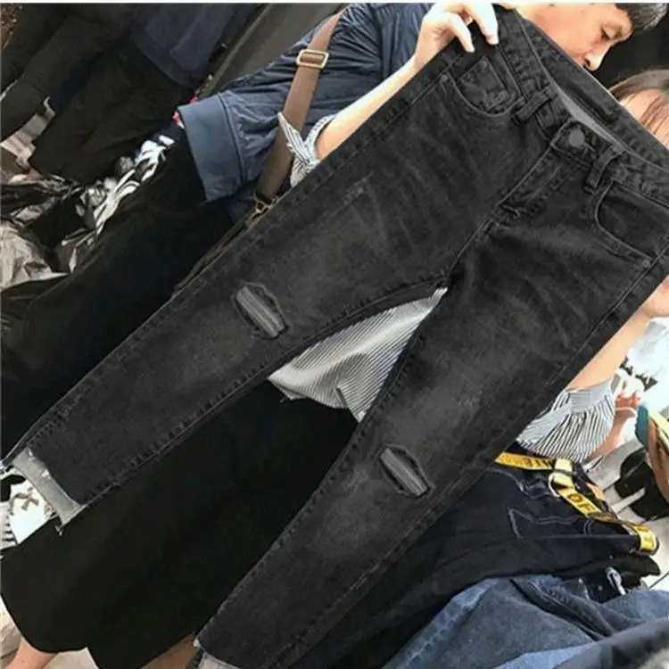 Hoge taille afslankende denim jeans Dames Faion potloodbroek Asymmetrische split Enkellange rechte pijpen Trendy gescheurd gat