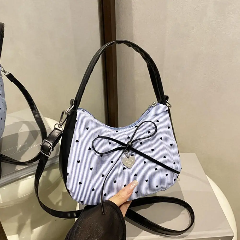 

Fashion Bow Handbag for women Sweet Print Metal heart Pendant Underarm pouch Single shoulder Commuting Hand-held Crossbody bag
