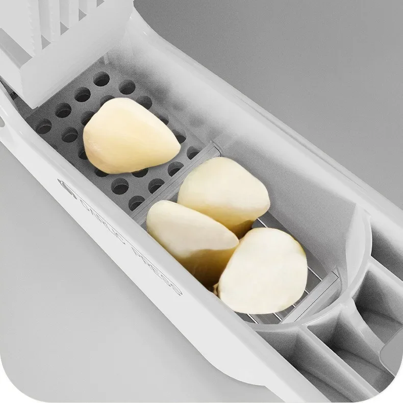 4 in 1 Ergonomic Handle Multifunctional Garlic Mincer Slicer Food-Grade ABS Stainless-Steel Garlic Press Can Opener Vegetables