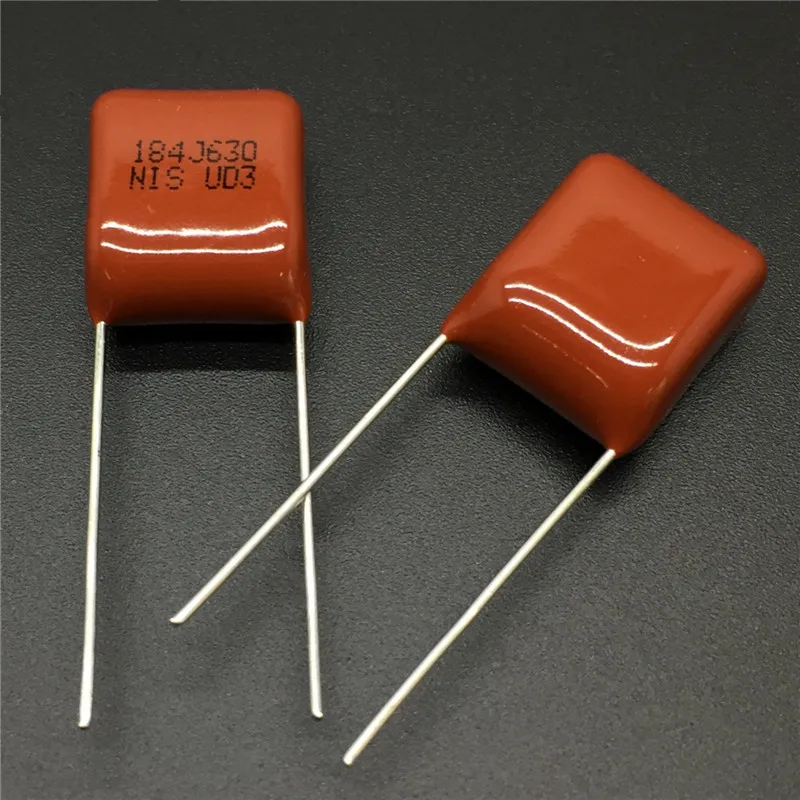 10Pcs/100Pcs Japan NISSEI CBB capacitor MMX 630V 184 J 630V184J 5% 0.18uF 180nF Pitch=10mm Metallized polyester film capacitor