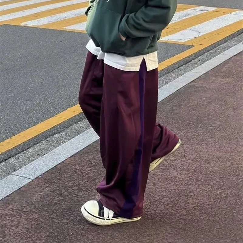 25ss เย็บปักถักร้อยผีเสื้อ Nee dles ขากว้างกางเกงลาย 1:1 Oversize Claret AWGE Casual กางเกงแท็ก