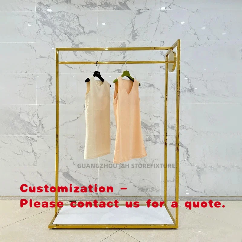 

custom.New Design Clothing Store Display Rack Garment Clothing Display Floor Standing Heavy Duty Portable Gold Clothing Display