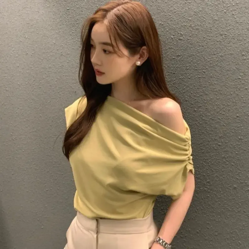 2024 Shirts for Women White Diagonal Collar Crop Tops Off Shoulder Short Sleeve Tshirt Lady Korean Wild OL Pleated T-shirts