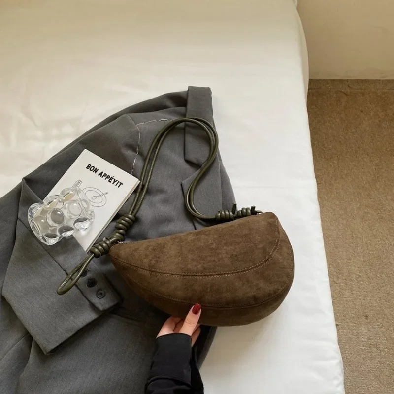 Luxury Minimalist Handbag For Ladies As A Shoulder And Crossbody Bag With Solid Color And Letter Logo As A Chic Diaper Bag
