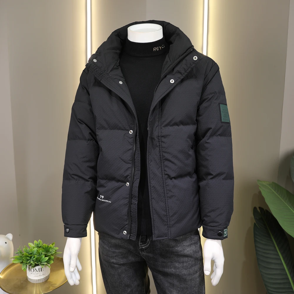 Down cotton-padded jackets for men in winter are of high quality, warm and cold-proof, with a stand-up collar and a simple desig